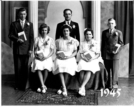 Dad and Alyce - Dad: standing, 1st on left - Alyce: seated, 1st on left